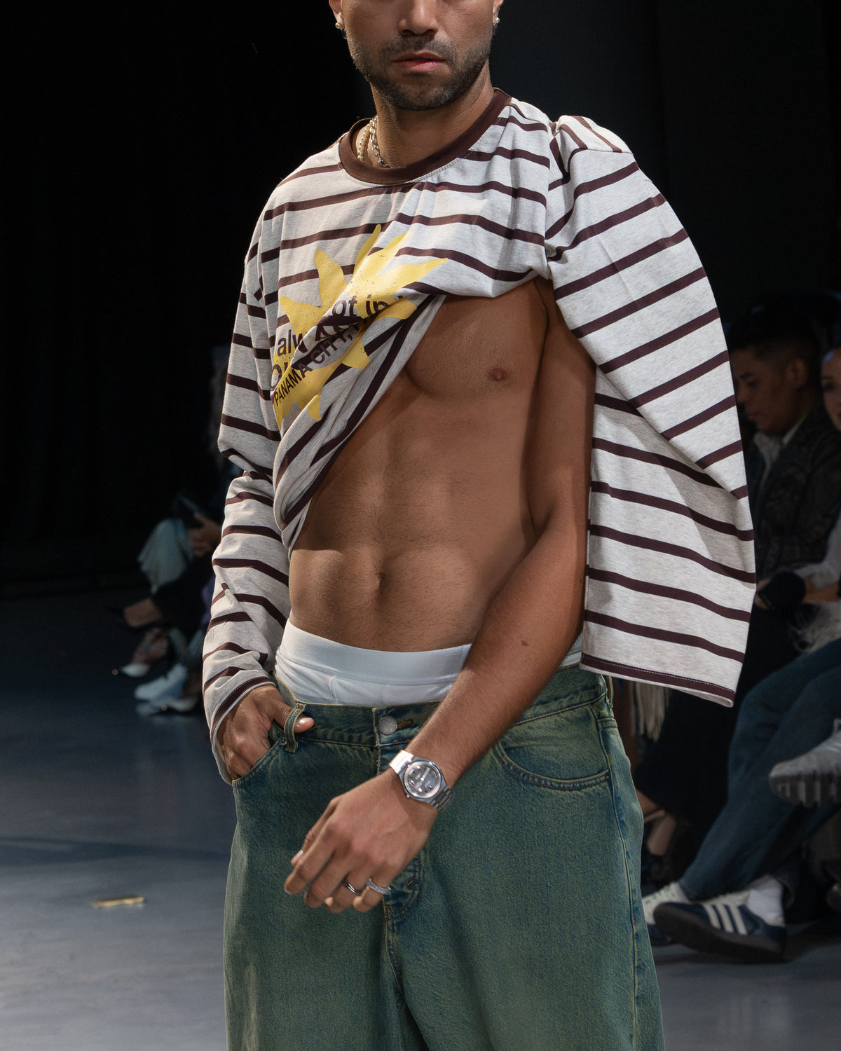Golden Angels runway: Detail of the striped top and olive trouser styling
