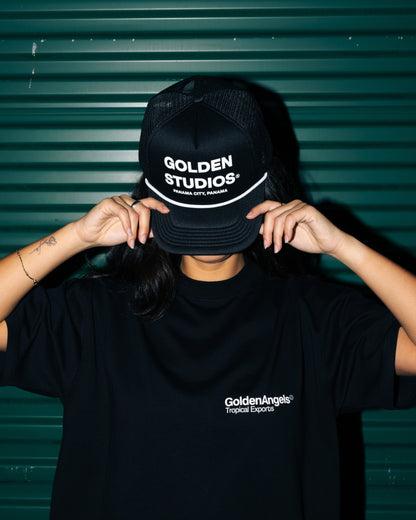 GA® Golden Studios Trucker Hat Black — editorial styling and fit reference