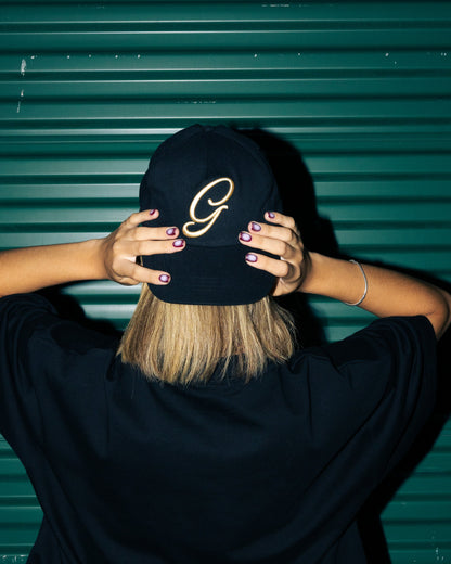 GA® Script G Cap Black — editorial styling and fit reference