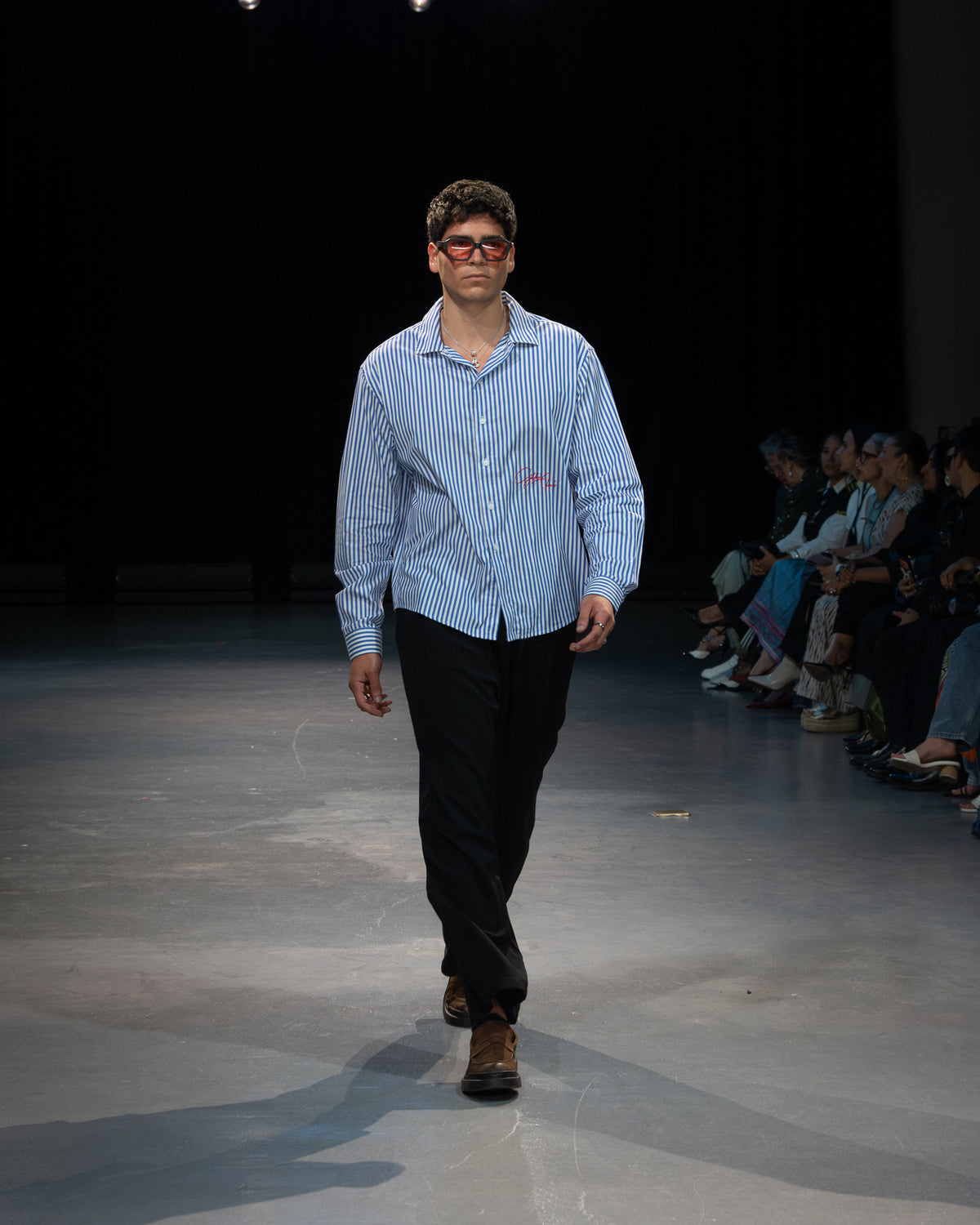Golden Angels runway: Light blue striped shirt with black trousers