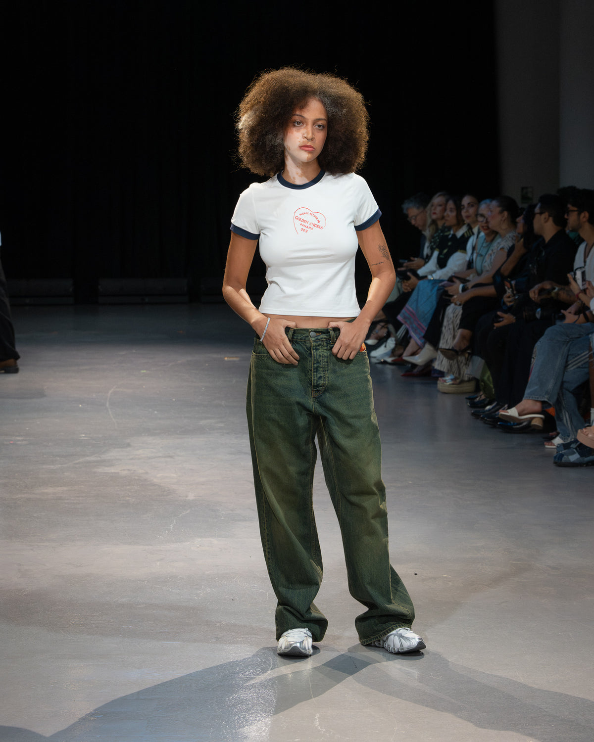 Golden Angels runway: White cropped T-shirt with olive cargo trousers