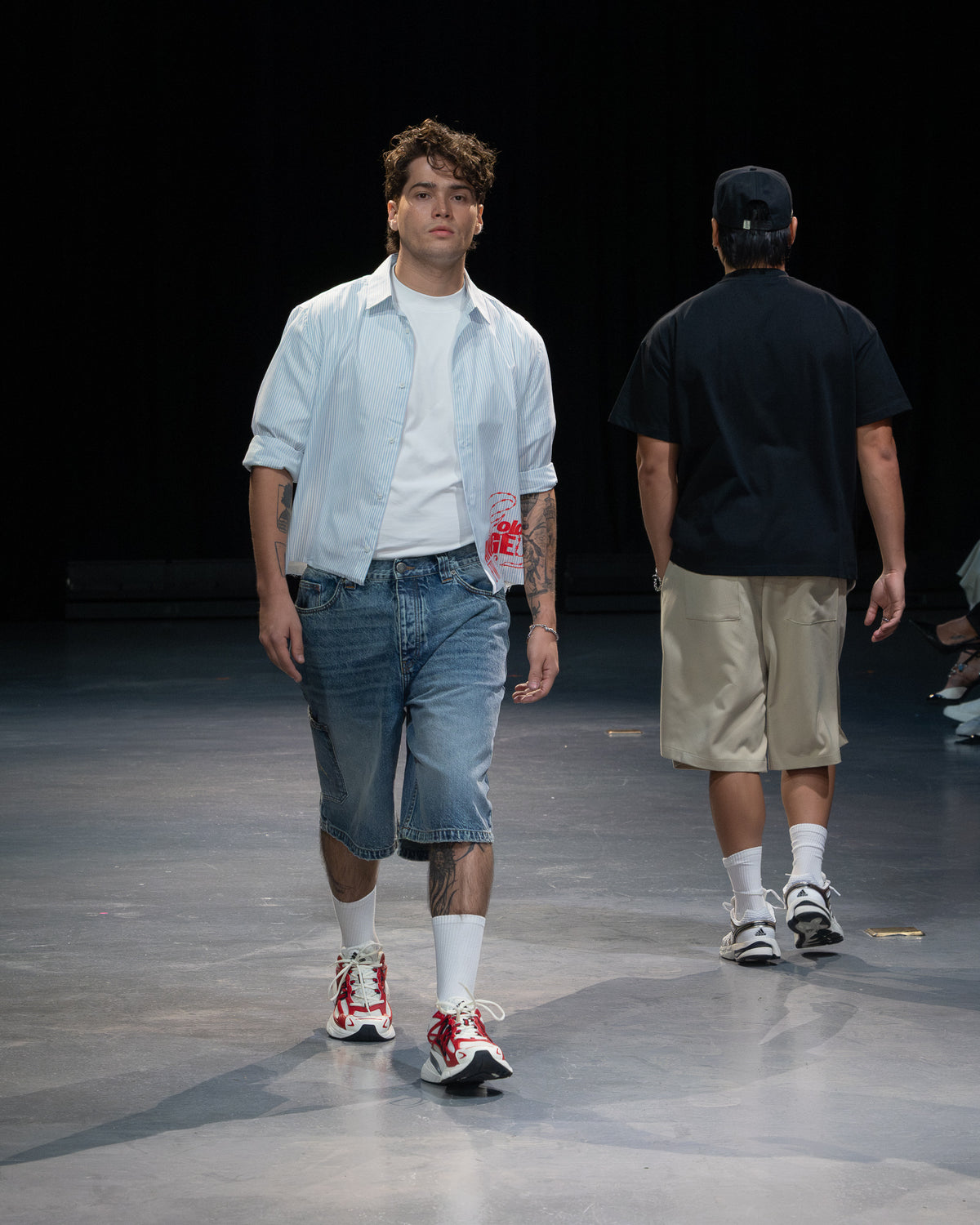 Golden Angels runway: Light blue overshirt, white T-shirt and denim shorts