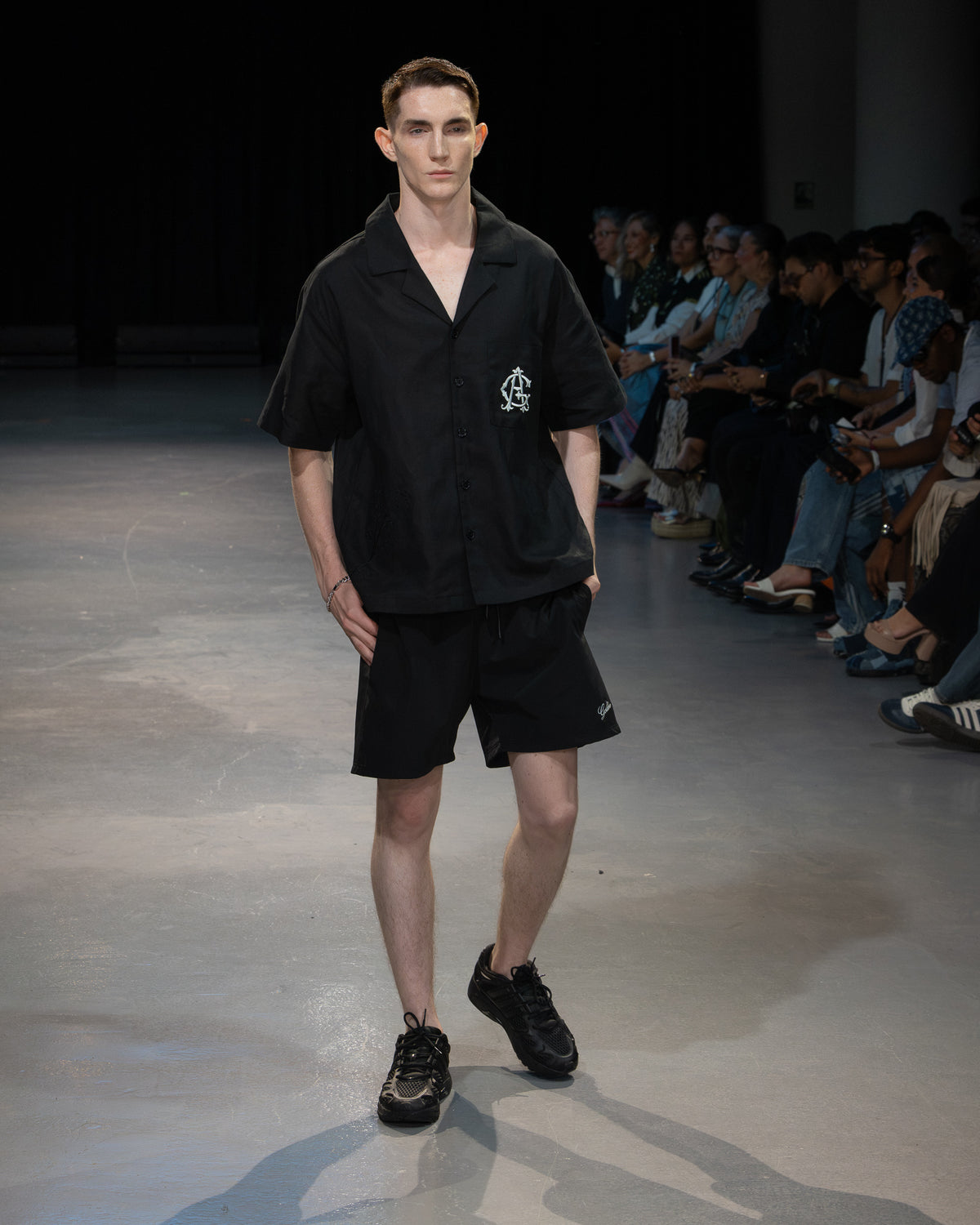 Golden Angels runway: Black short-sleeve shirt and matching shorts