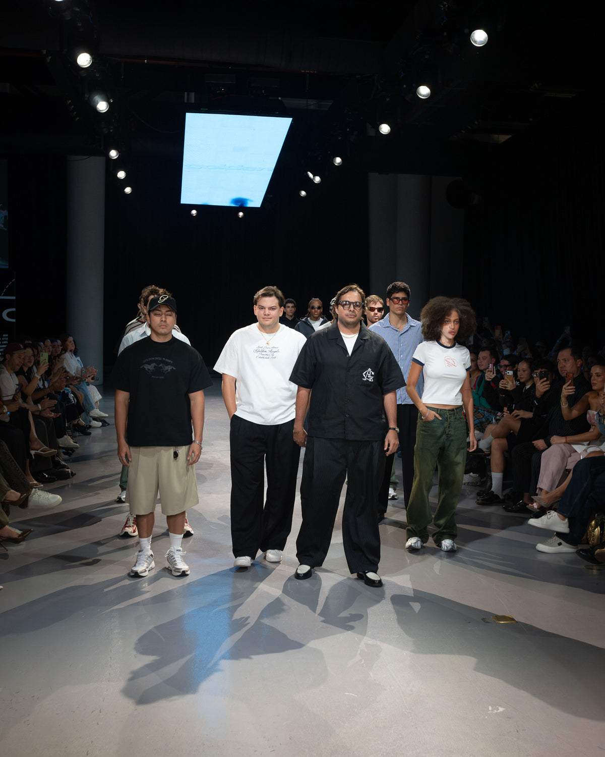 Golden Angels runway finale with the cast lined up on the catwalk